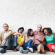 Describing People without racial ND ETHNIC BIASE - SITTING GROUP OF DIVERSE PEERS