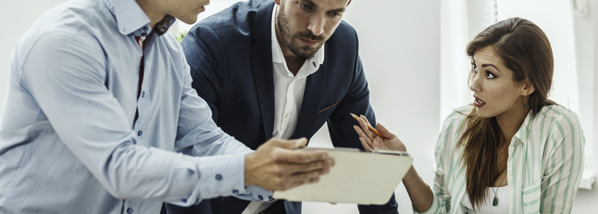giving constructive feedback image of business team communicating