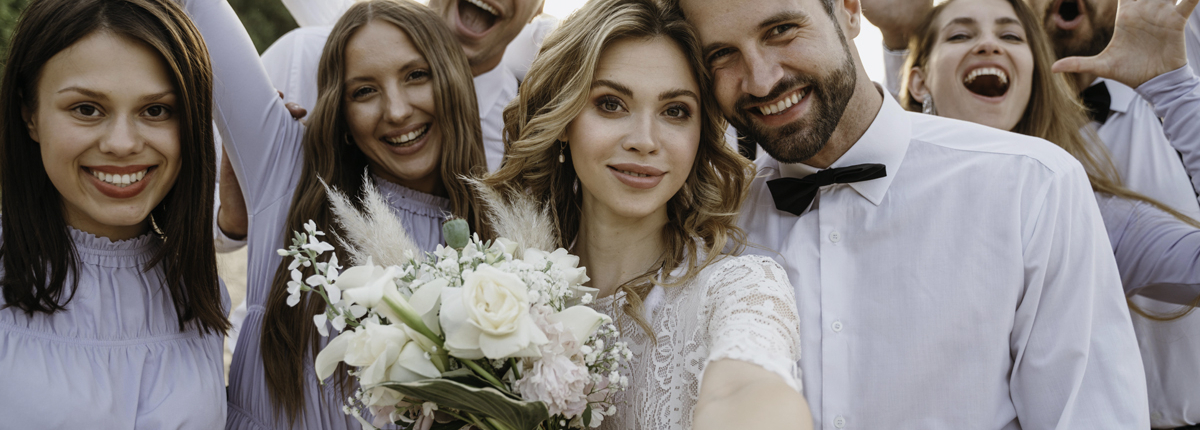 well-wish expressions group of wedding people for header image